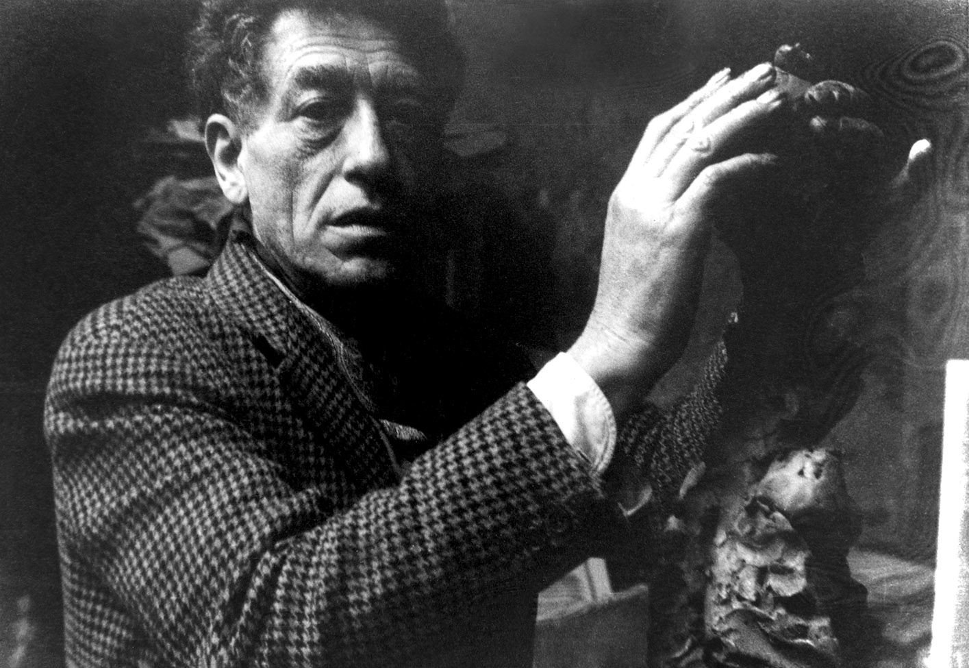 Alberto Giacometti working on the bust of Yanaihara in his Studio, 1960Photo Annette Giacometti.jpg