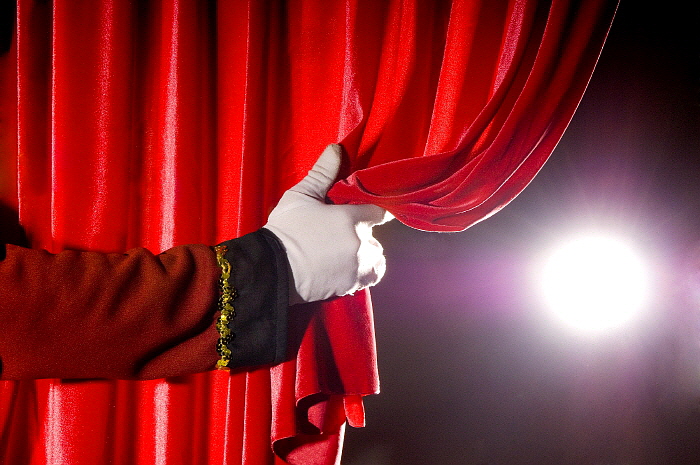 Pulling_apart_curtains.jpg