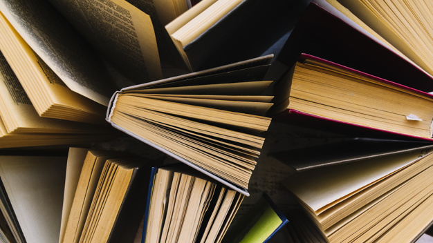 top-view-messy-book-group_23-2147978248.jpg