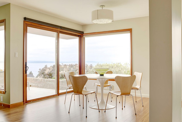 8361a18103d82291_9291-w618-h413-b0-p0--midcentury-dining-room.jpg