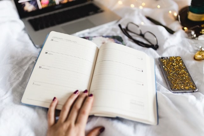 work-notebook-books-bed.jpg