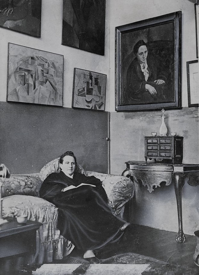 Gertrude_Stein_sitting_on_a_sofa_in_her_Paris_studio.jpg