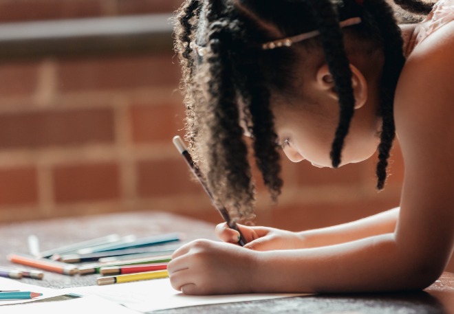 little-girl-drawing-is-focused.jpg