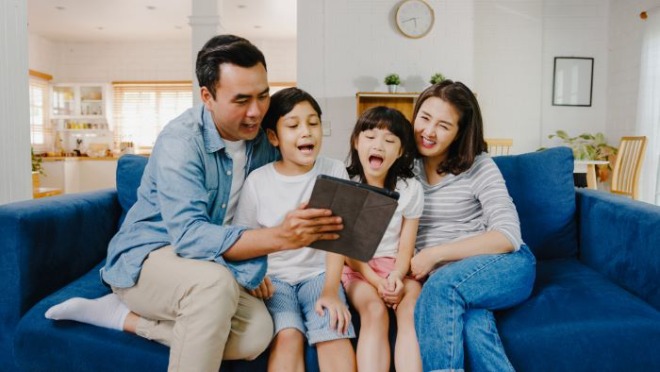 happy-cheerful-asian-family-dad-mom-kids-having-fun-using-digital-tablet-video-call-sofa-house.jpg