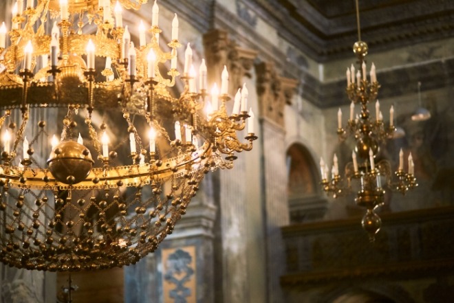 golden-chandelier-hangs-from-ceiling-church.jpg