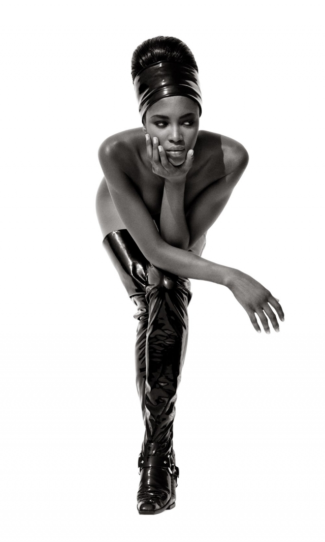 Naomi Campbell face in hand.jpg
